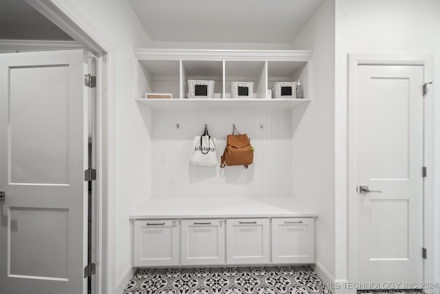 mudroom featuring light tile patterned flooring