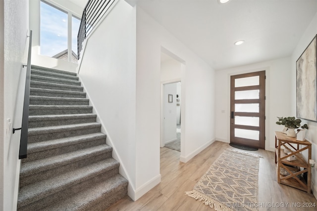 entrance foyer featuring light wood-type flooring