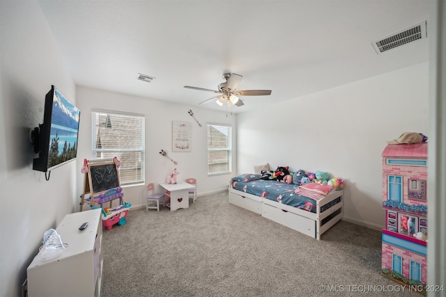 carpeted bedroom featuring ceiling fan