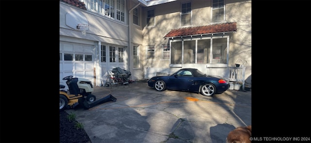 exterior space with a garage