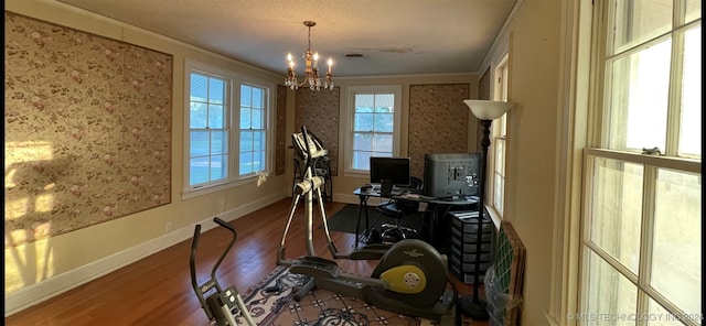 interior space with an inviting chandelier and hardwood / wood-style floors