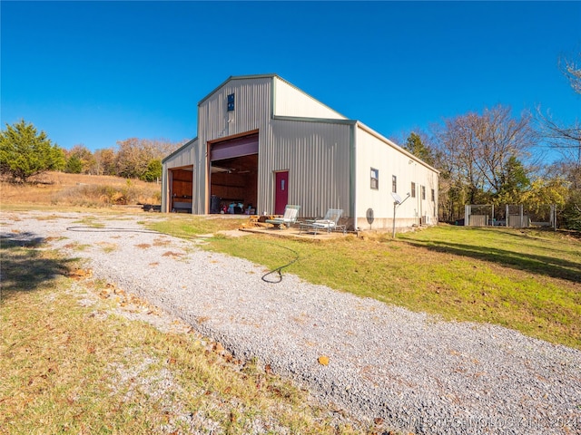 view of outdoor structure with a yard