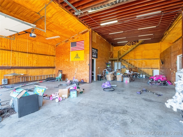 garage featuring a garage door opener