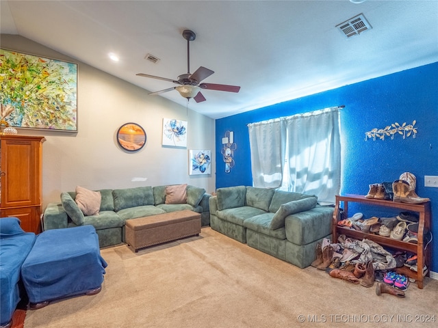 living room with light colored carpet, vaulted ceiling, and ceiling fan