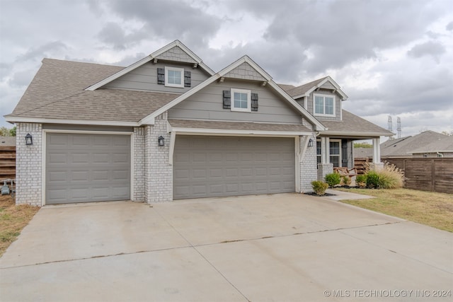 craftsman house featuring a garage