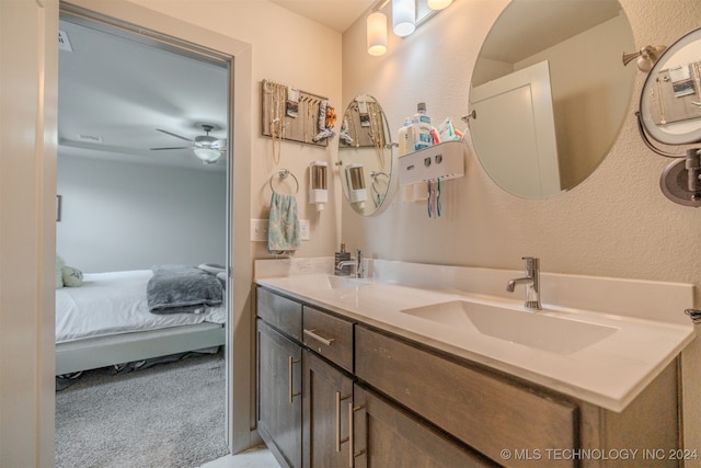 bathroom with vanity and ceiling fan