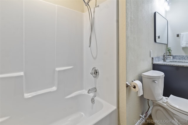 full bathroom with shower / washtub combination, toilet, and vanity