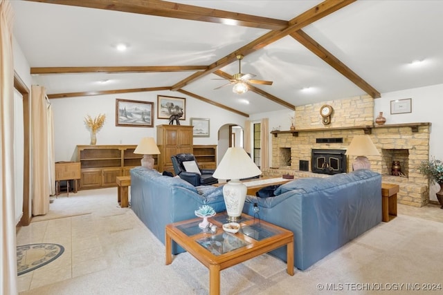 carpeted living room featuring ceiling fan and lofted ceiling with beams