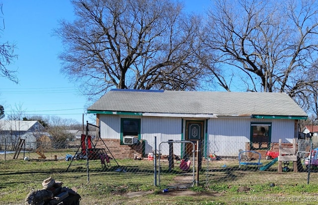 exterior space featuring fence and cooling unit