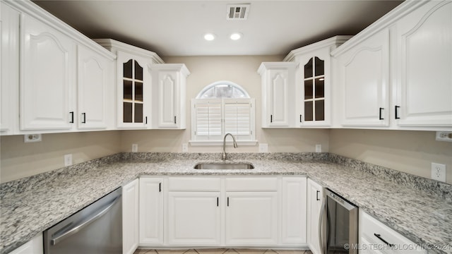 kitchen with wine cooler, dishwasher, sink, and white cabinetry