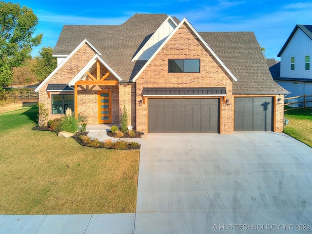 view of front of property featuring roof with shingles, driveway, brick siding, and a front lawn