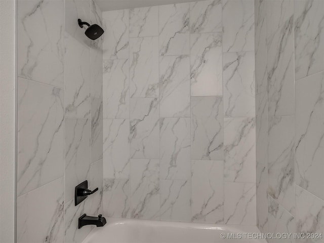 details with shower / bath combination