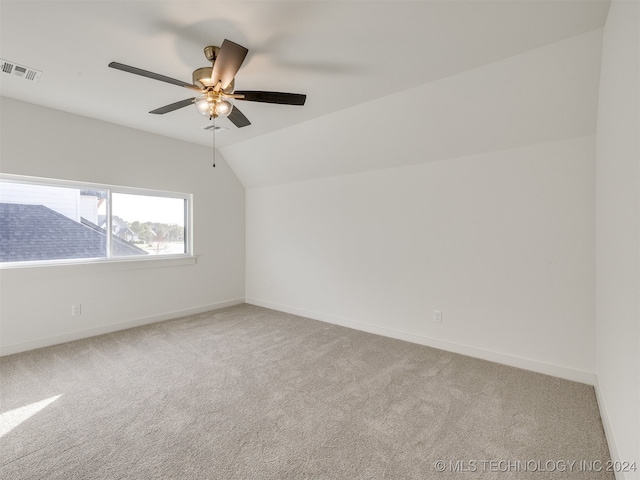 bonus room featuring light carpet, vaulted ceiling, and ceiling fan