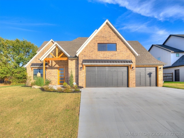 view of front facade with concrete driveway, a front lawn, a shingled roof, and brick siding