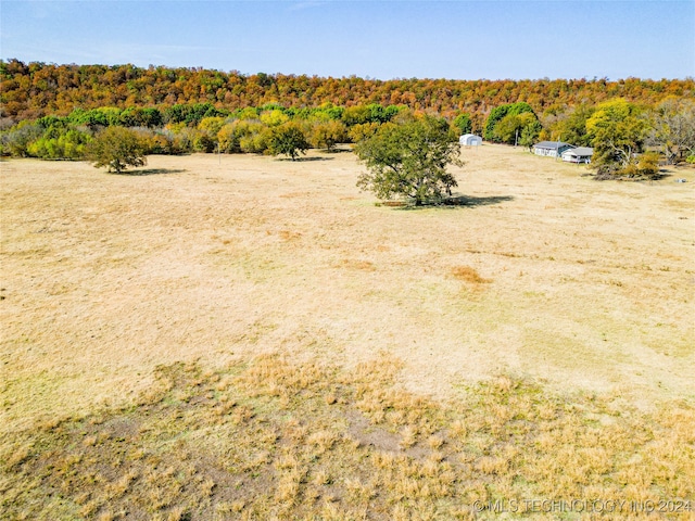 exterior space with a rural view