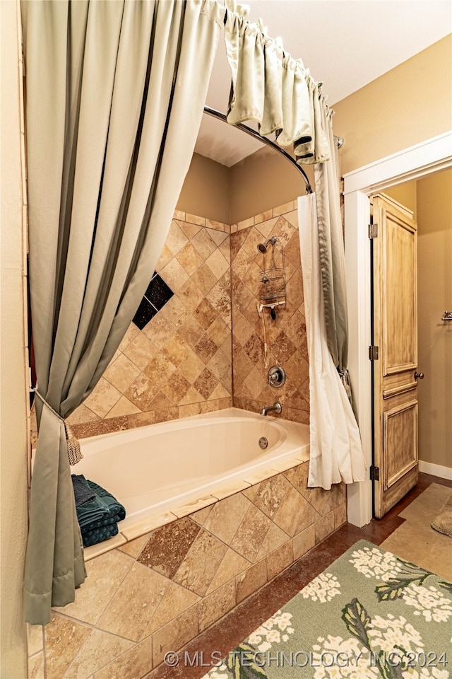 bathroom featuring shower / bath combo with shower curtain