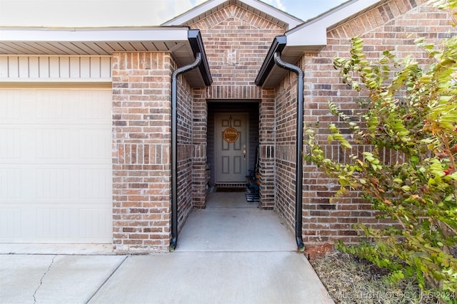 entrance to property with a garage