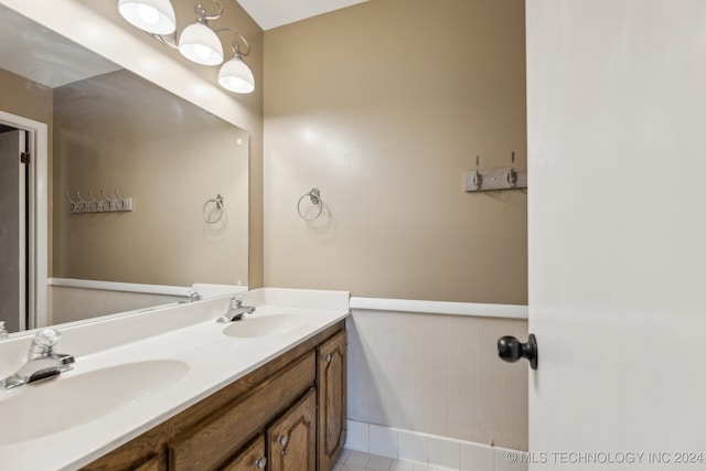 bathroom featuring vanity and tile patterned flooring