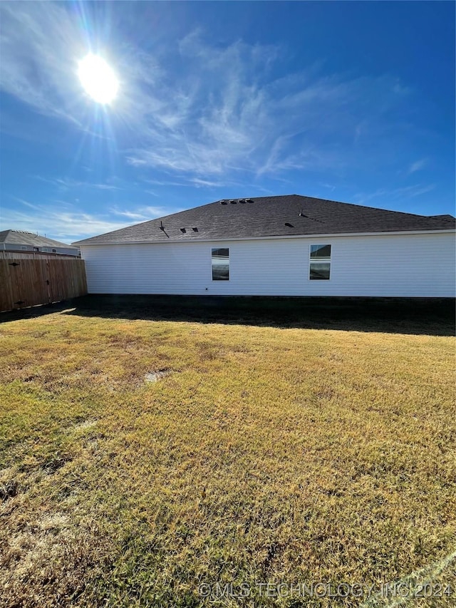 view of home's exterior featuring a lawn