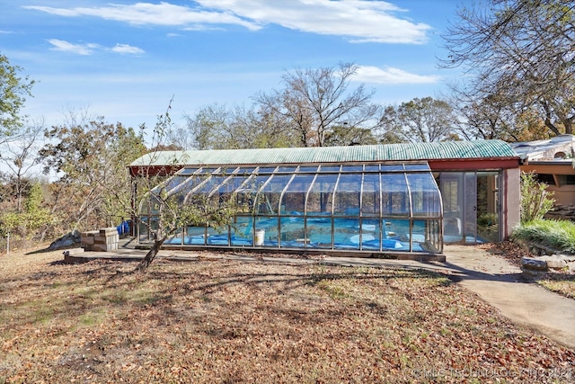 exterior space featuring a lanai