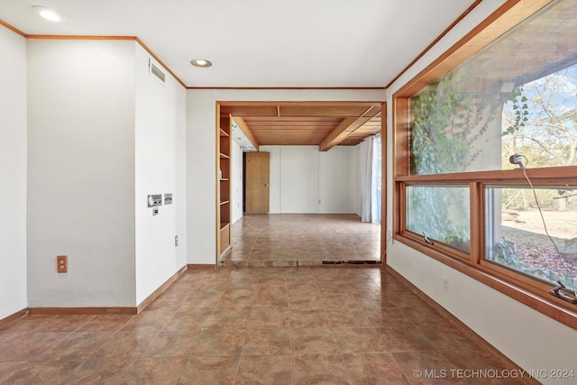 hallway with wood ceiling, ornamental molding, and built in shelves