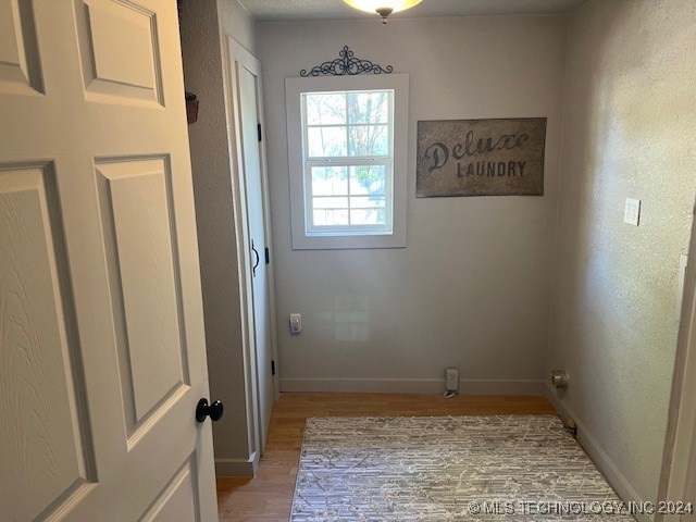 washroom featuring light hardwood / wood-style floors