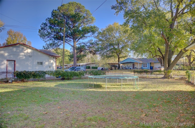 view of yard featuring a trampoline