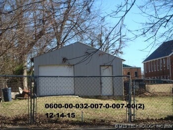 view of outdoor structure with a garage