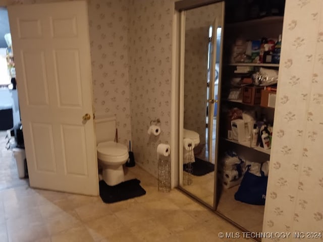 bathroom featuring toilet