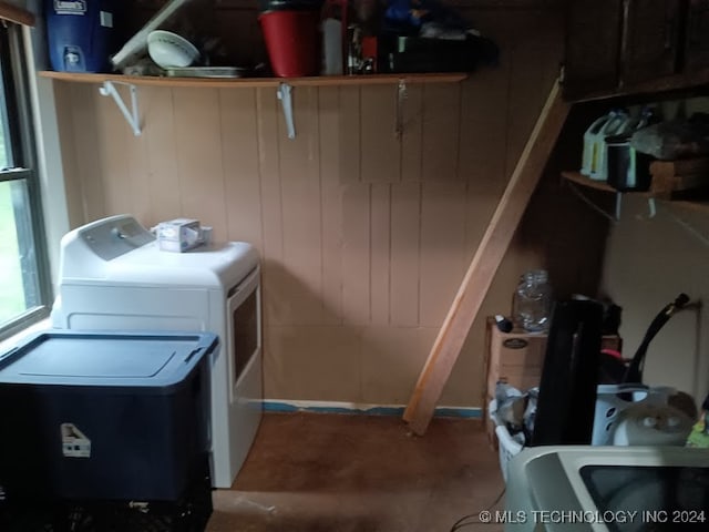 laundry area featuring washing machine and clothes dryer