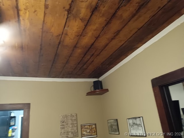 details featuring wooden ceiling and ornamental molding