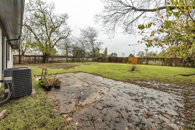 view of yard with a patio area and cooling unit