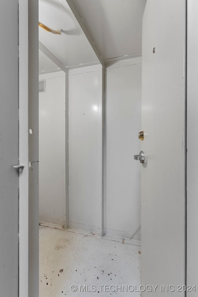 bathroom featuring concrete floors