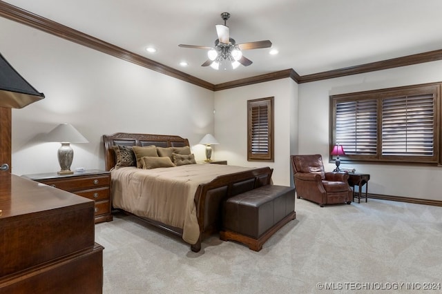 bedroom with ceiling fan, crown molding, and light colored carpet