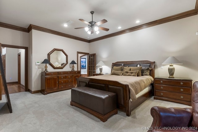 bedroom featuring ceiling fan, crown molding, and light carpet