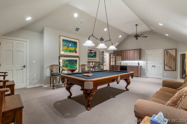 game room with light carpet, ceiling fan, vaulted ceiling, and billiards