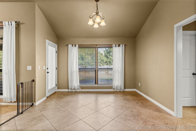 interior space featuring an inviting chandelier and lofted ceiling