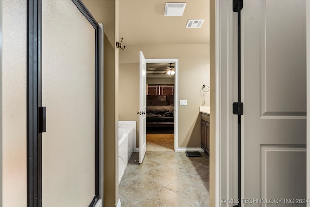 bathroom with vanity, shower with separate bathtub, and tile patterned flooring