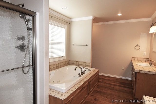 bathroom featuring crown molding, plenty of natural light, and hardwood / wood-style flooring