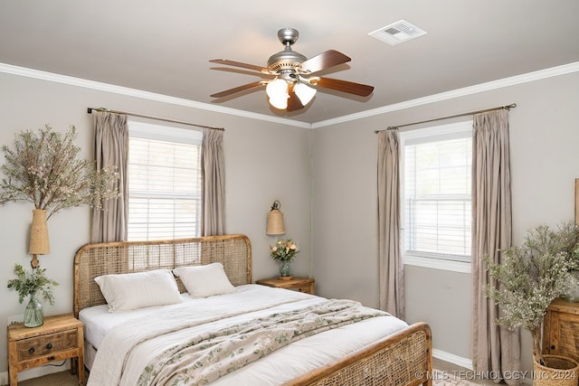 bedroom featuring ceiling fan and ornamental molding