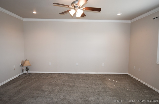 unfurnished room featuring dark colored carpet, ceiling fan, and ornamental molding