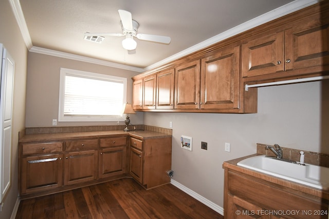 clothes washing area with ceiling fan, sink, cabinets, washer hookup, and crown molding