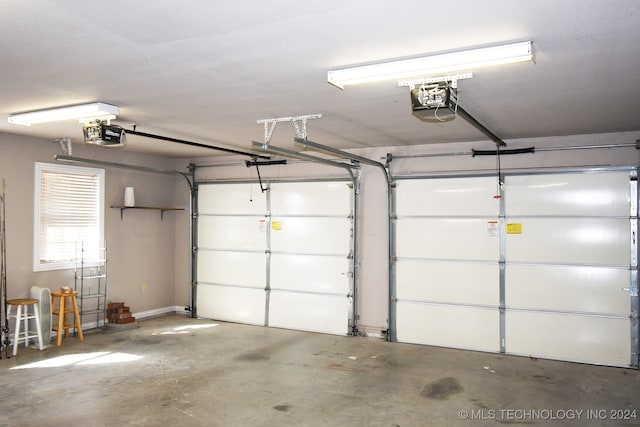 garage featuring a garage door opener