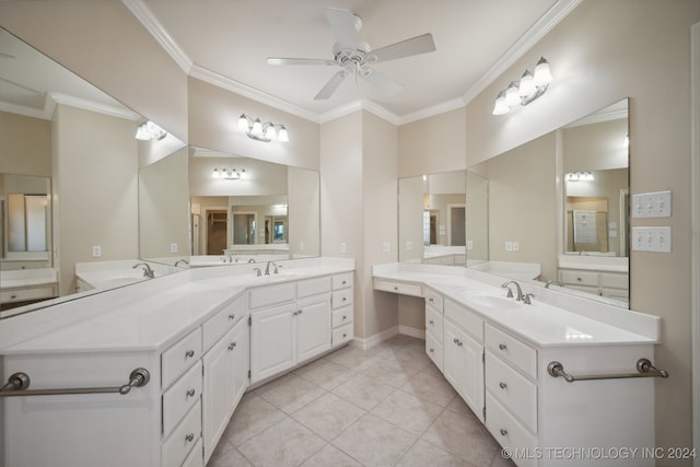 bathroom with vanity, crown molding, and tile patterned flooring