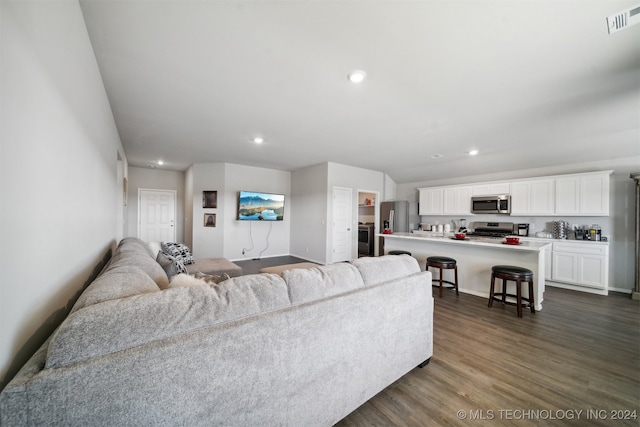 living room with dark wood-type flooring