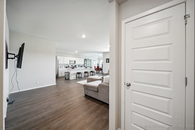 living room with dark wood-type flooring