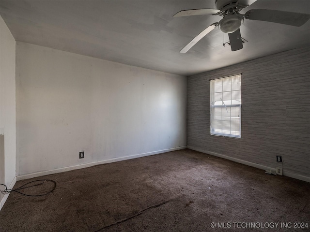 unfurnished room with carpet floors and ceiling fan