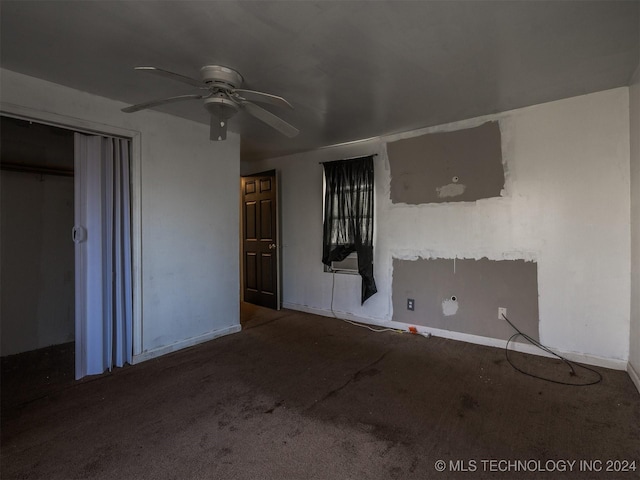 unfurnished bedroom with carpet floors, a closet, and ceiling fan