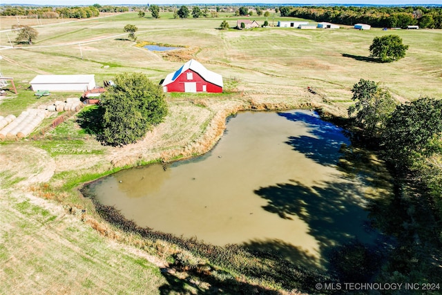 bird's eye view featuring a water view and a rural view