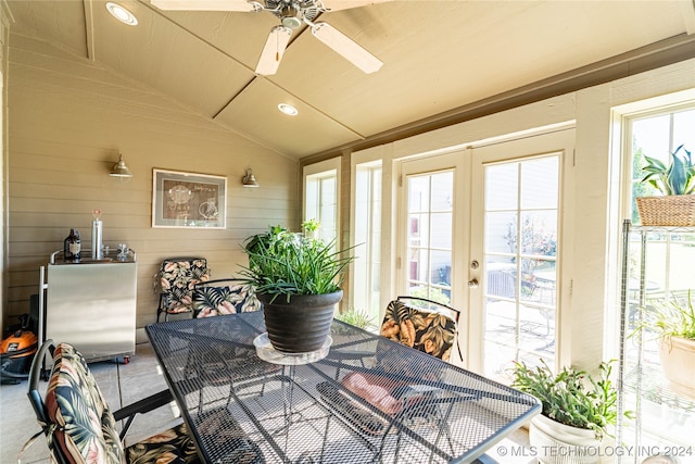 sunroom with french doors, vaulted ceiling, and ceiling fan